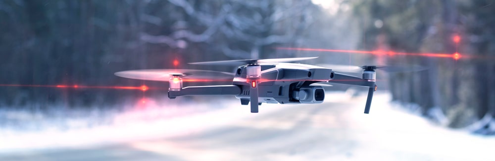 drone uav in winter snow roadway